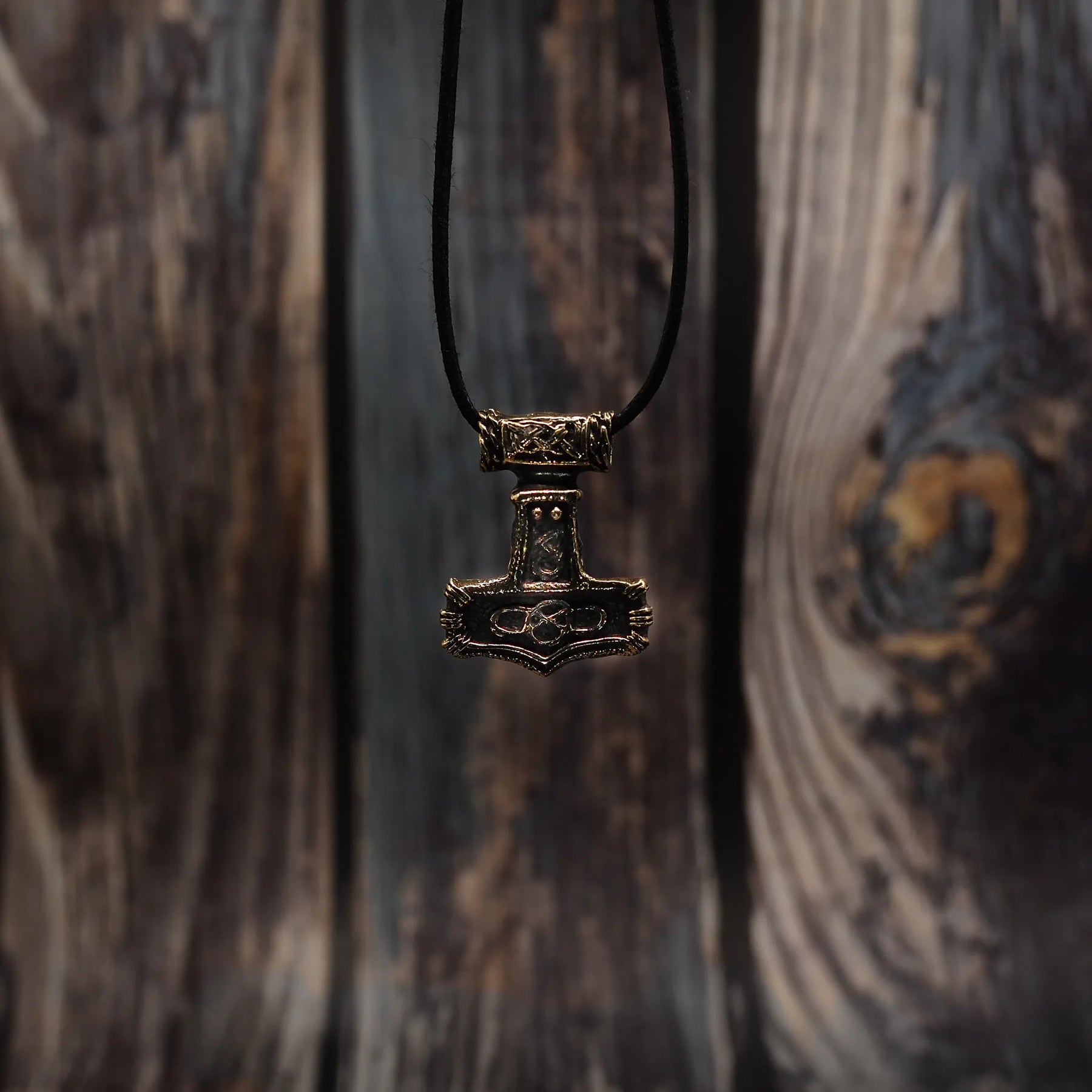 Bronze Thor's hammer pendant with prominent eternity symbol and Norse knotwork, Evig styrka collection