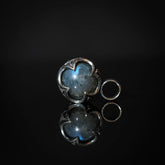 Två Gotlandshängen med labradorit i silverpläterad mässing, vikingatida mönster och blå-grå natursten