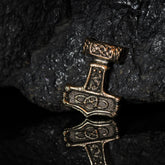 Detailed bronze Thor's hammer pendant with Norse knotwork and eternity symbol patterns, Evig styrka collection