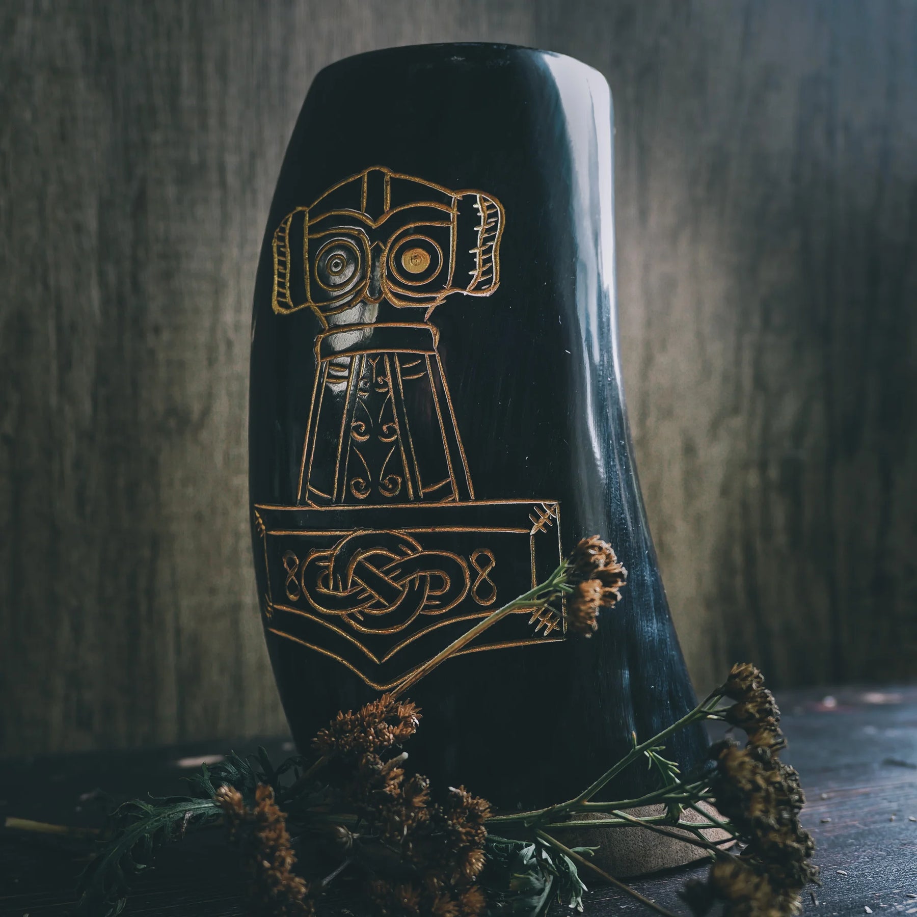 Black polished organic horn beer mug with gold-inlaid Thor's hammer and Nordic interlace band design