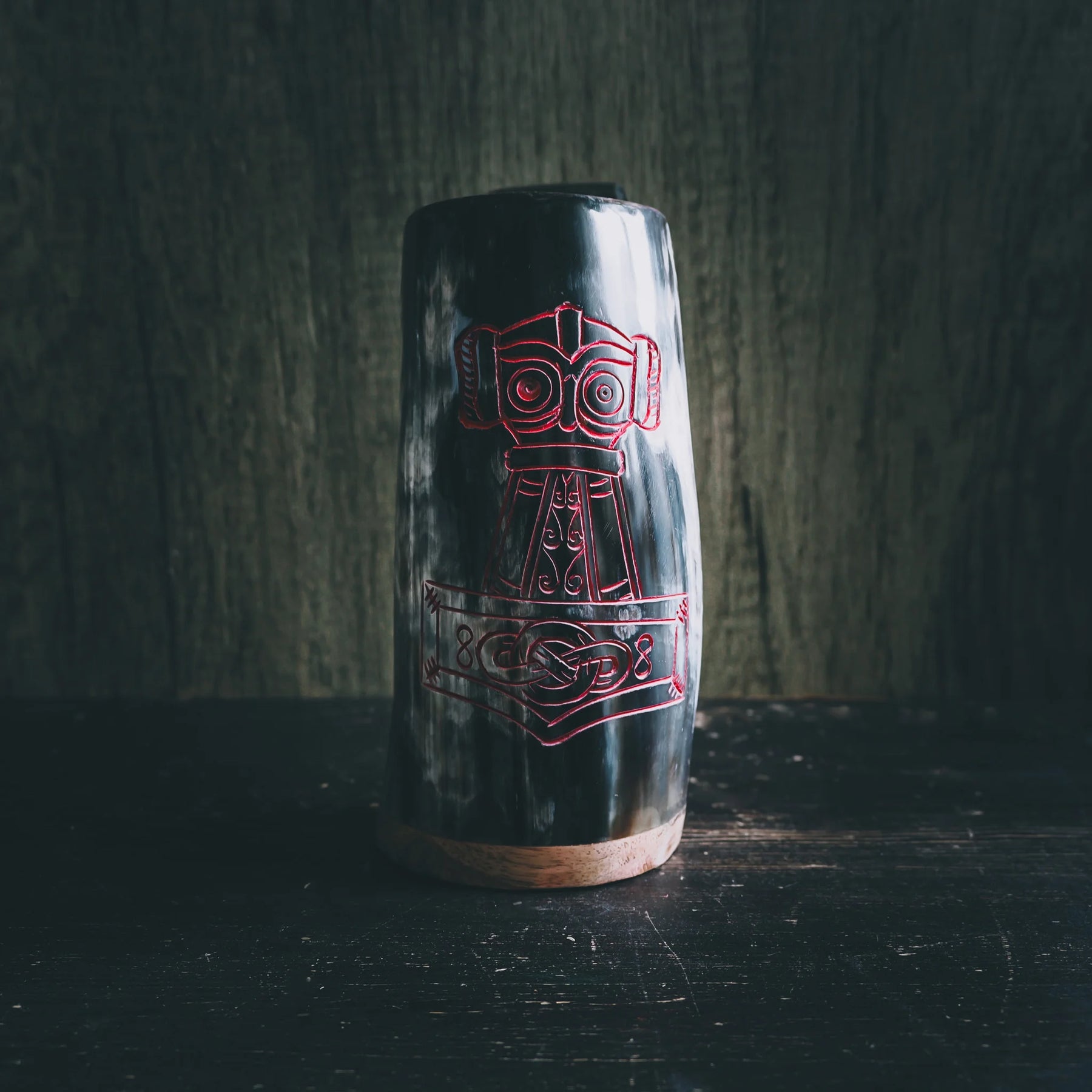 Black organic horn beer mug with red engraved Thor's hammer and Nordic geometric patterns