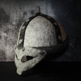 Tovad ull hjälm sidoprofilvy - visar kullformen och den strukturella detaljen omkring underkanten