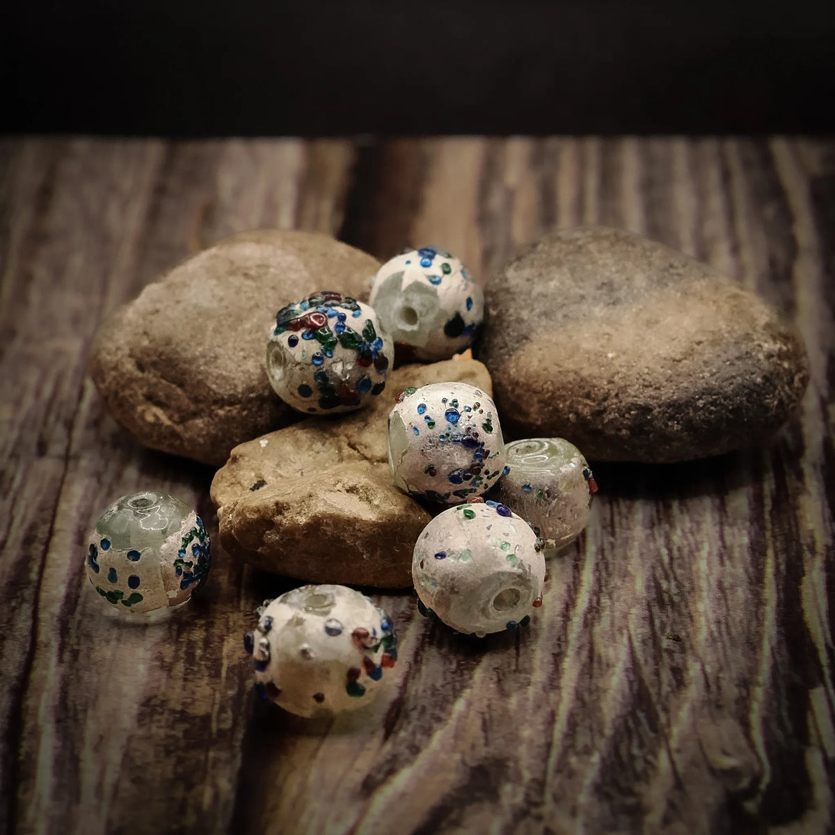 Round white glass beads with blue and navy confetti dots, 10mm, suitable for jewelry making and crafts