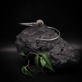 Adjustable upper arm ring with purple amethyst semi-precious stone, silver-plated brass construction with ornamental wire wrapping details