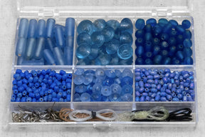 Complete blue bead collection box with six glass bead compartments in different shades and jewelry hardware