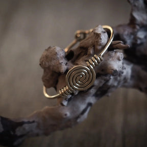Solspiral armband, mässing.