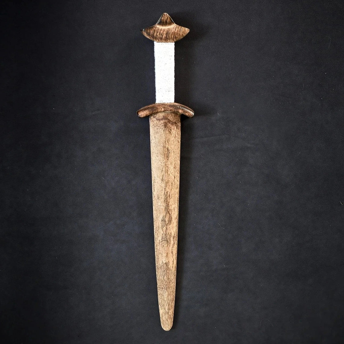 Wooden Viking toy dagger with burned decorations, designed for young warriors and children's imaginative play