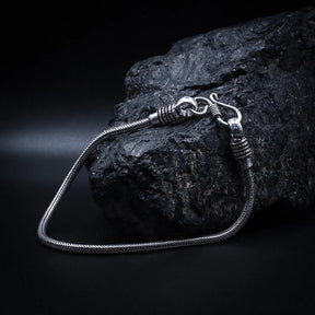 Silver-plated brass snake chain necklace with Norse animal head clasp and rope-pattern detailing