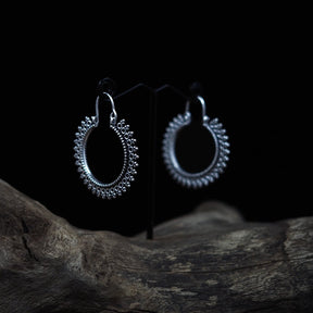 Örhängen Solringar., smycke med vikingtemadesign.