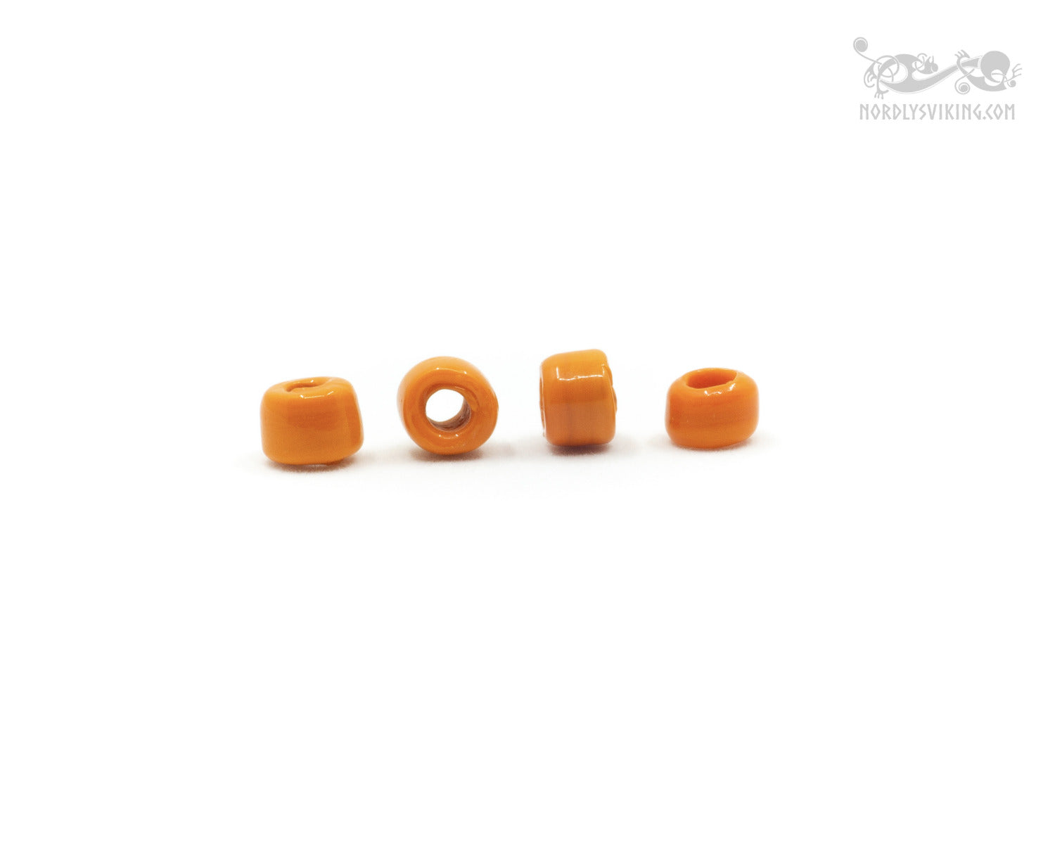 Orange glaspärla.