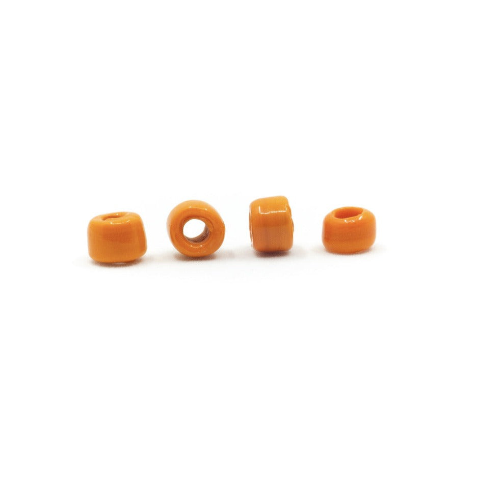 Orange glaspärla.