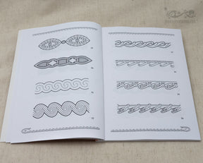 Book page showing 8 numbered Viking and Slavic ornamental design patterns including knotwork, rope patterns, spirals, and wave motifs rendered as black line drawings