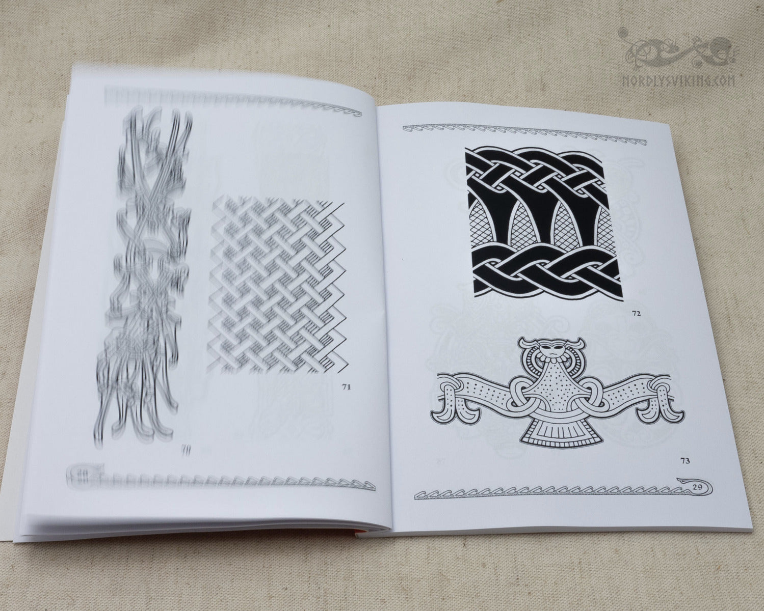 Book page displaying Viking ornamental designs including interlocking geometric patterns, hatching techniques, and Celtic knotwork with animal motif in black line art