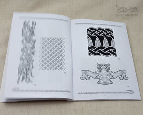 Book page displaying Viking ornamental designs including interlocking geometric patterns, hatching techniques, and Celtic knotwork with animal motif in black line art