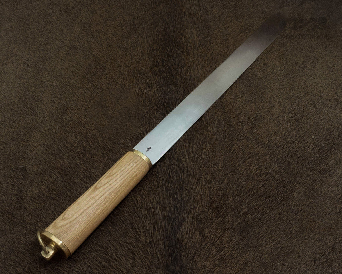 Vikingsk seax med järnutformning och detaljerad hantering.