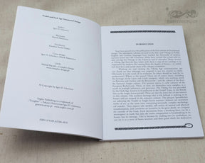 Book pages displaying Vendel and Dark Age animal-style ornamental patterns with interlocking creatures and serpent designs